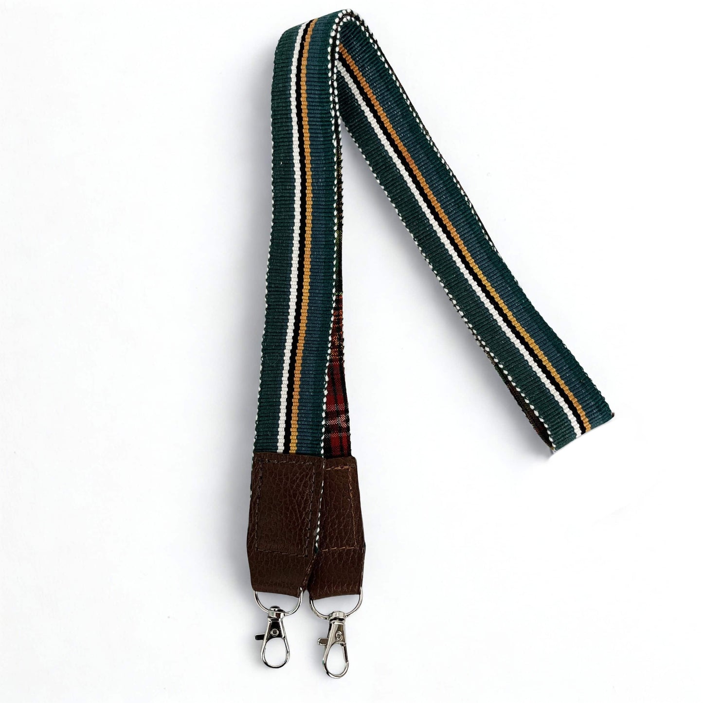 Bolso cilindro tonos verdes - Colección Raíces a rayas