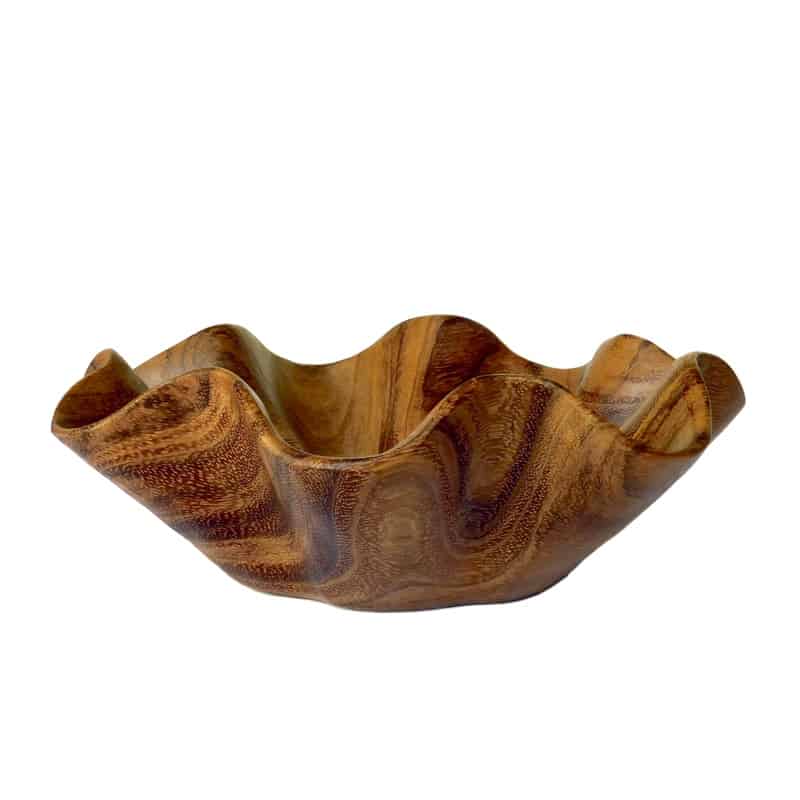 vista de lado de un tazón tallado en madera