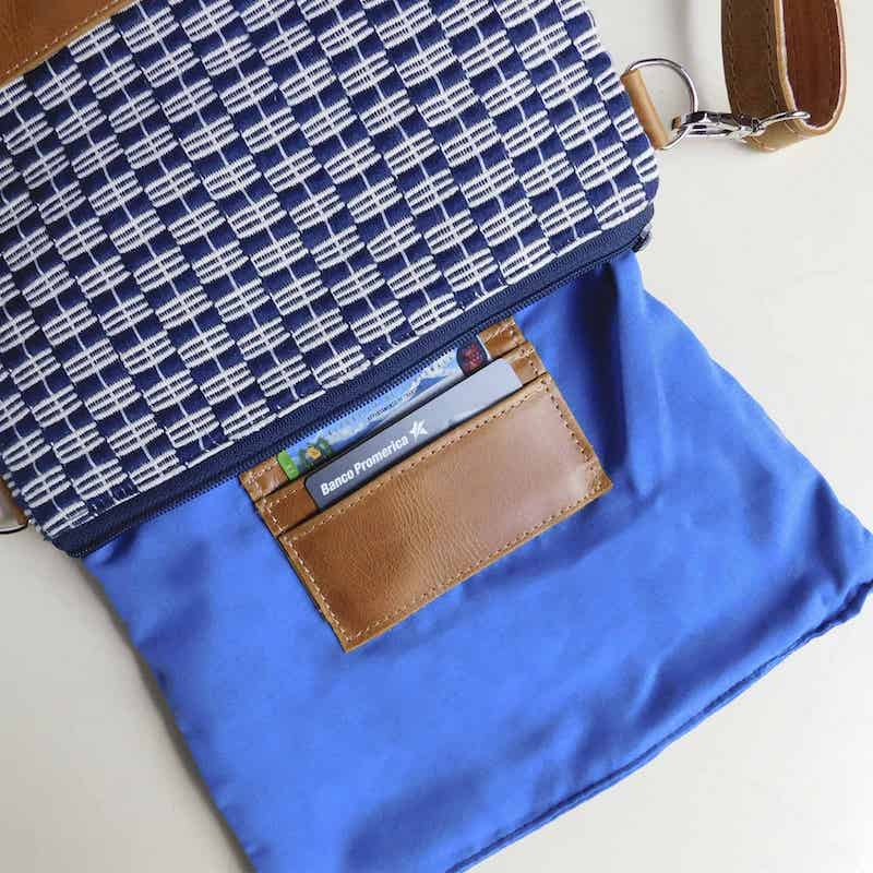leather clutch bag lined with blue cotton