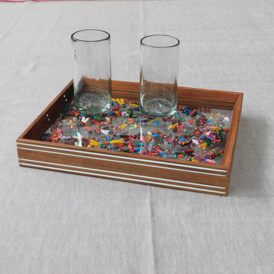 Bandeja con muñecas quitapenas