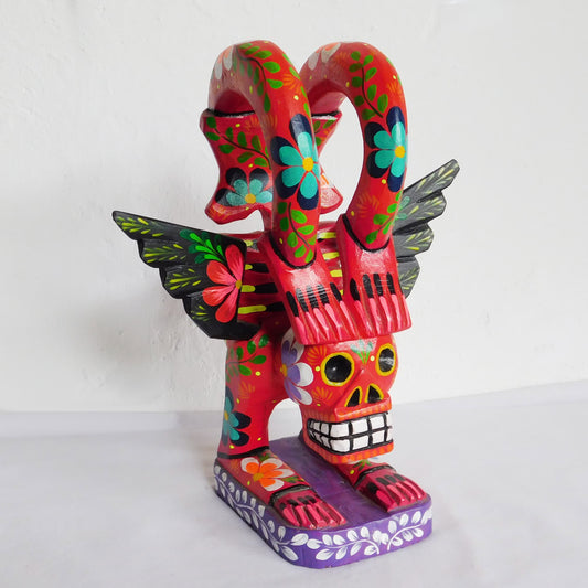 Figura decorativa de esqueleto acróbata en madera