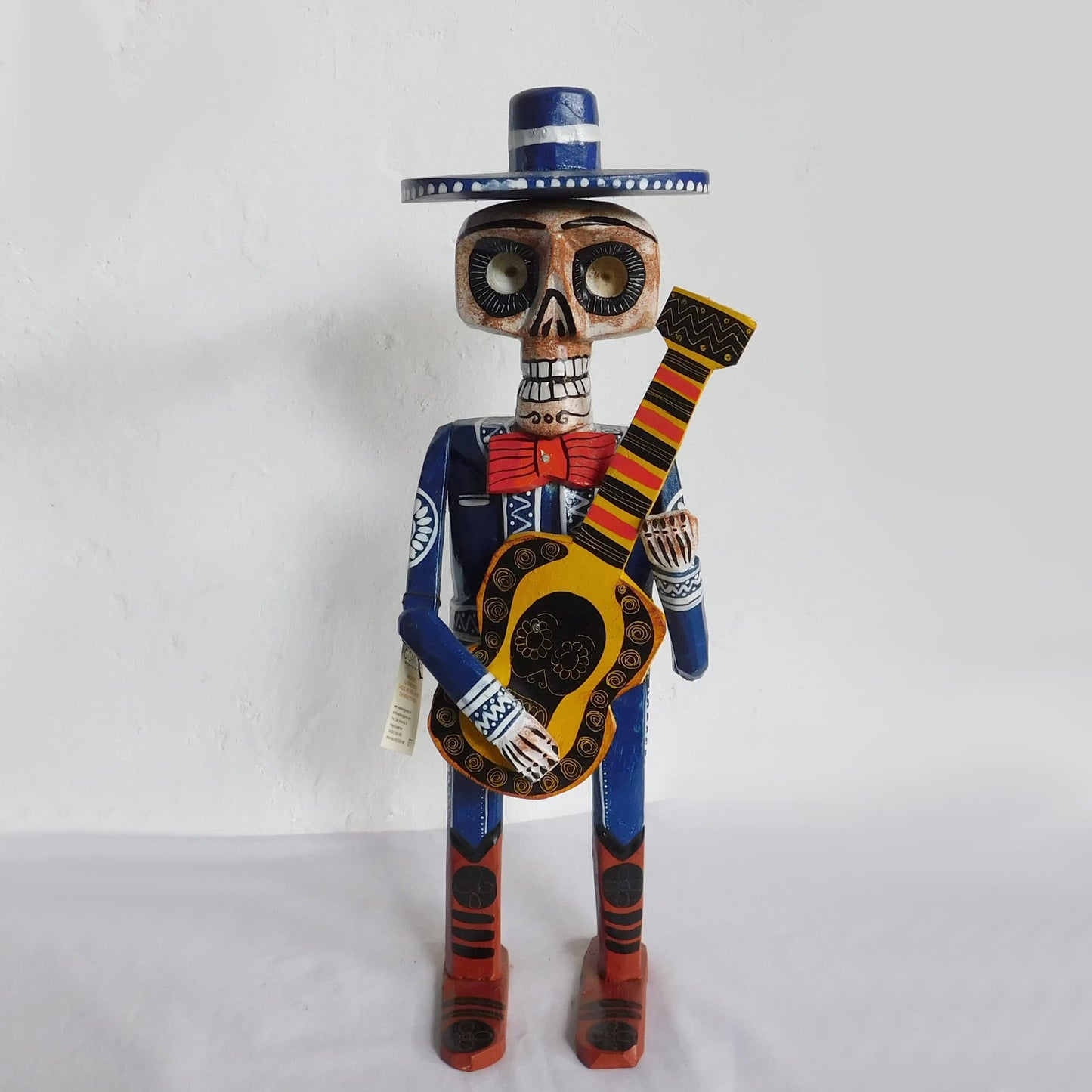 Figura decorativa de esqueleto musico