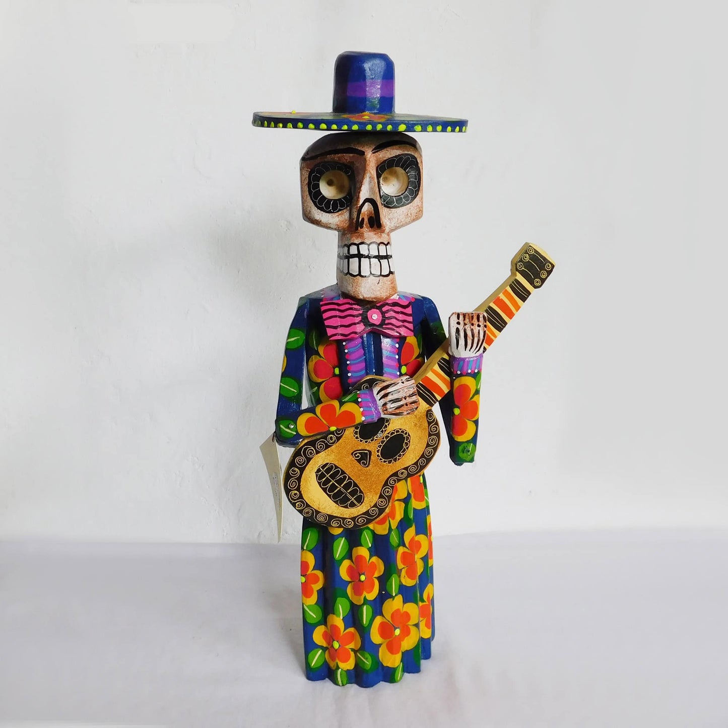 Figura decorativa de esqueleto musico