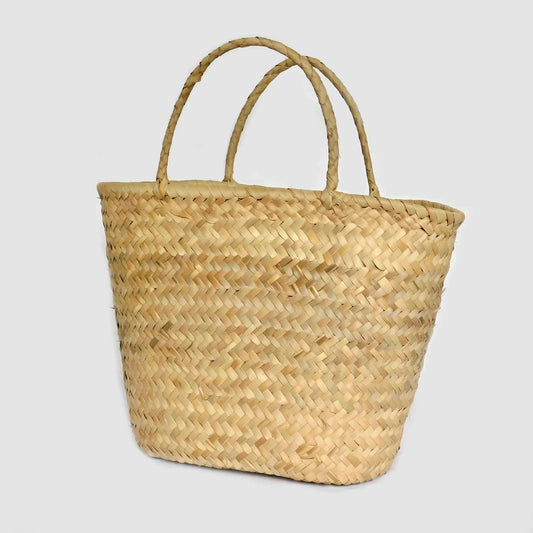 Canasta para la playa de fibra de palma